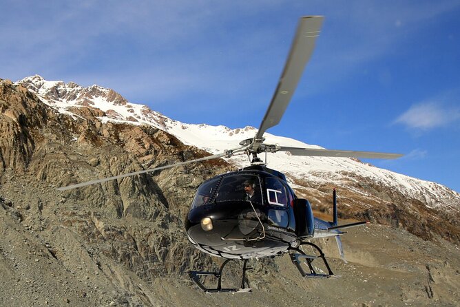 25-Minute Helicopter flight including an alpine landing - Weather, cancellations, and the minimum group rule