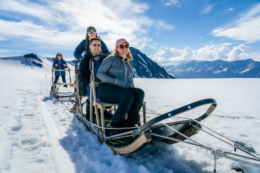 Anchorage Area: Helicopter and Glacier Dogsled Tour - Landing on snow near Knik Glacier