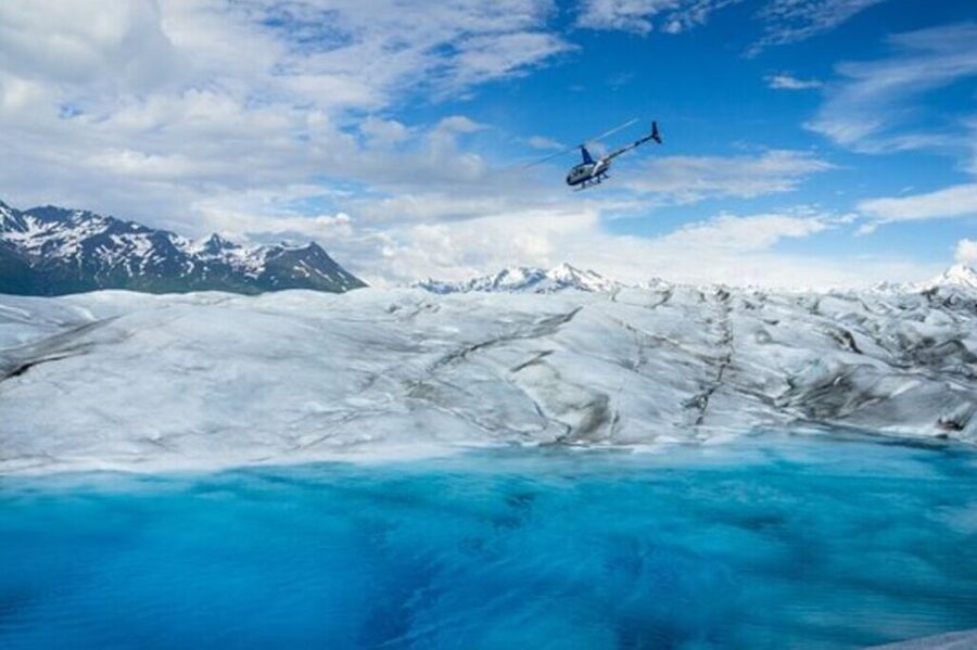 Anchorage: Knik Glacier Helicopter and Paddleboarding Tour - Paddling through remote glacier pools