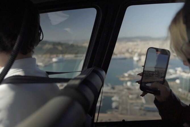 Barcelona Official Helicopter Tour with In-flight Video - Parc Forum and Port Forum add modern Barcelona