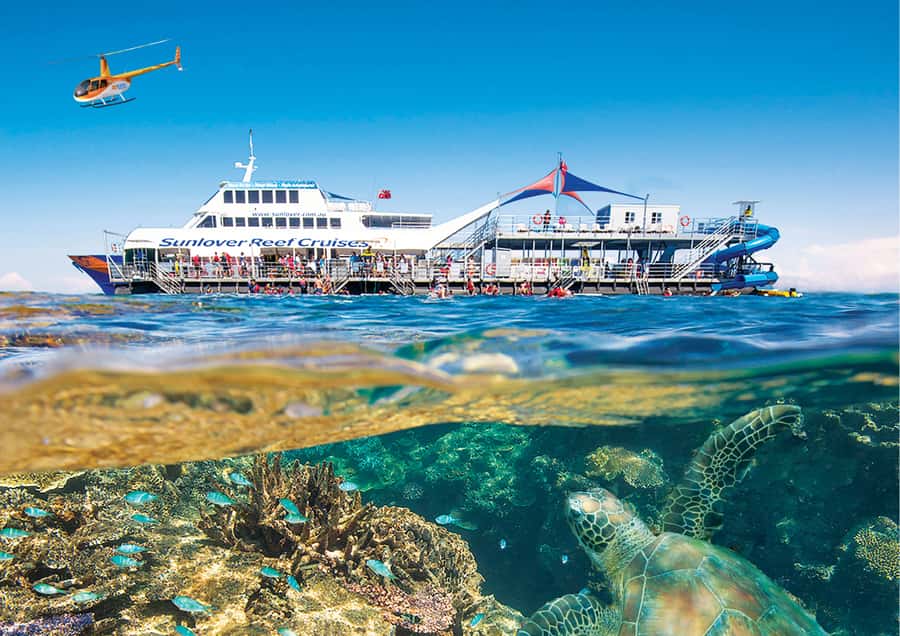 Cairns: Half Day Helicopter & Snorkeling Tour - The waterslide adds a surprising change of pace