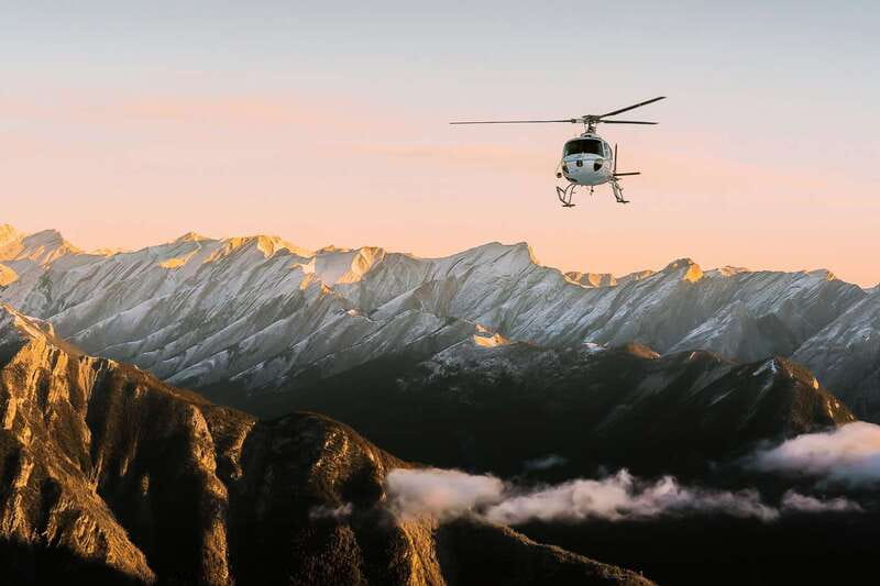 Canadian Rockies: Abraham Lake Ice Bubbles Helicopter Tour - Fire, coffee, and hot chocolate after the cold