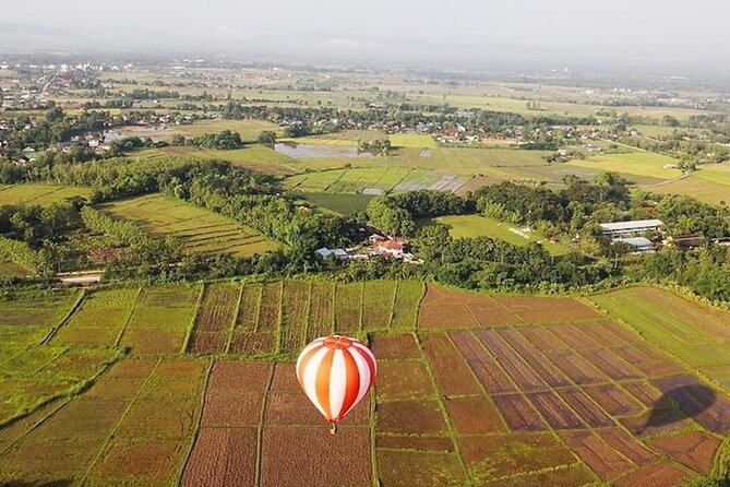 Chiang Rai Hot Air Balloon Flight – Guided Aerial Tour - Meeting at Singha Park and preparing for takeoff