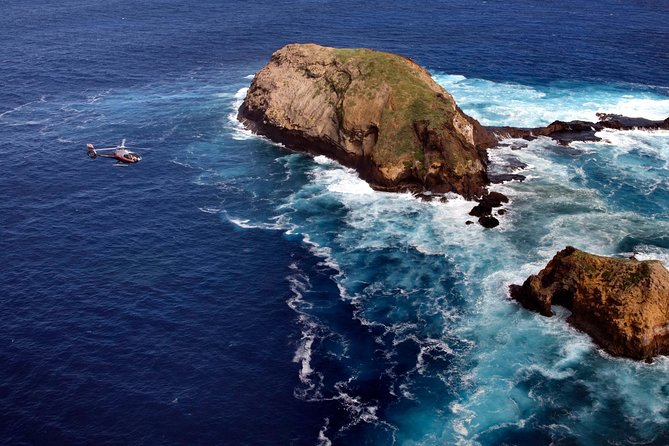 Deluxe Helicopter Tour of Molokai and Maui - Fishponds, coral reef, and a changing view of Molokai