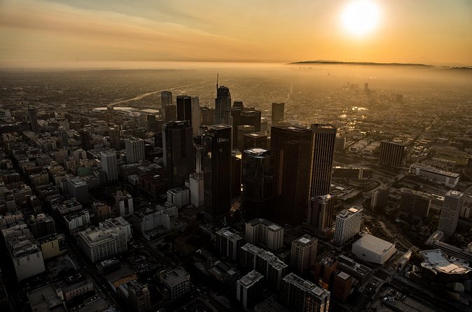 Downtown LA Lights: Your Private Sunset and Night Helicopter Tour - USC, the arena, and a fast-moving city view