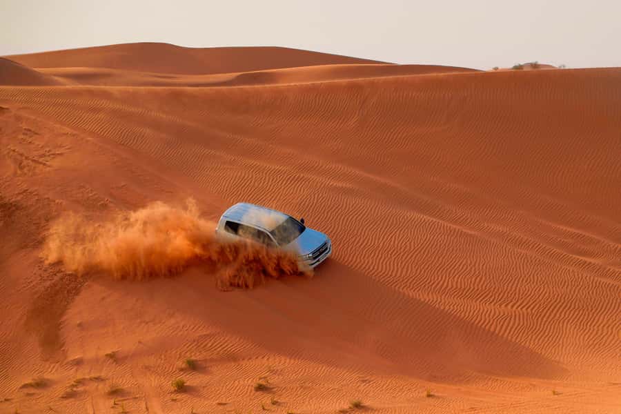 Dubai: Helicopter Ride, Desert Safari, Camels & Refreshments - Dune Bashing With a Licensed Guide