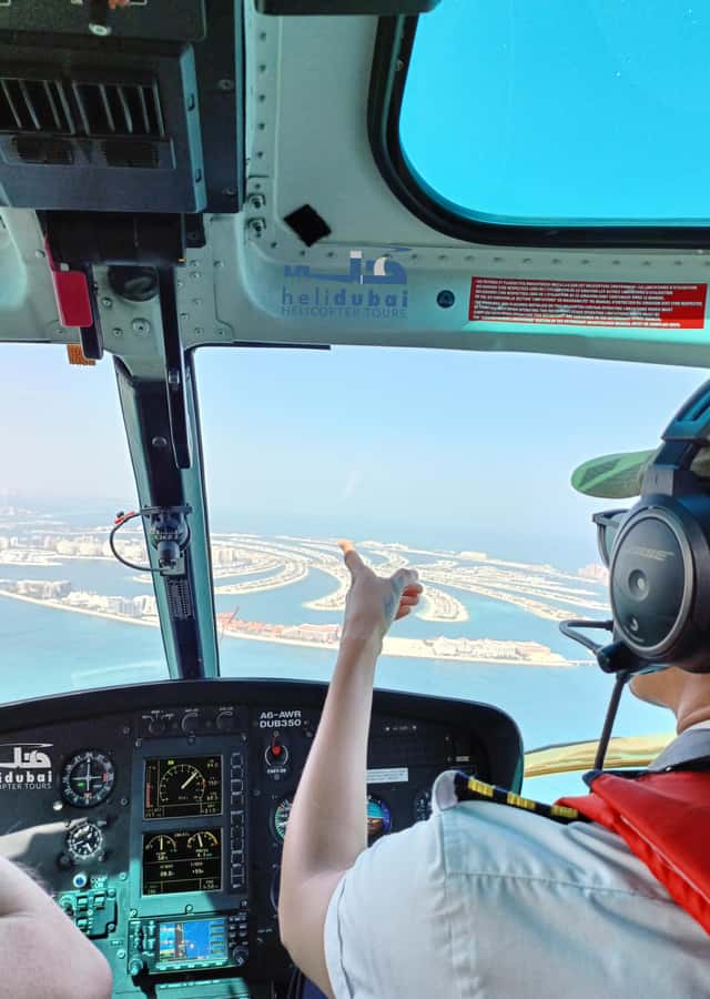 Dubai: Helicopter Ride, Old Town Walking Tour, Abra & Snacks - Walking through Al Fahidi and along Al Seef