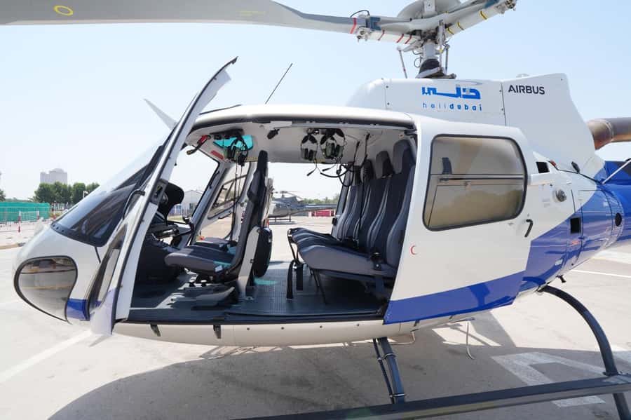 Dubai: Helicopter Ride, Old Town Walking Tour, Abra & Snacks - Gold and Spice Souks: a lively finish