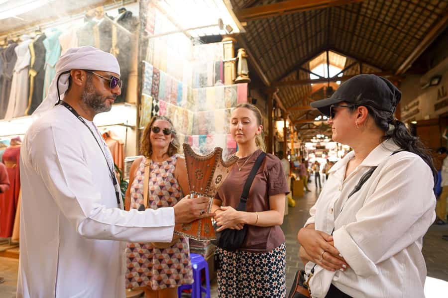 Dubai: Helicopter Ride, Old Town Walking Tour, Abra & Snacks - Coffee, dates, and Emirati hospitality at Al Khayma