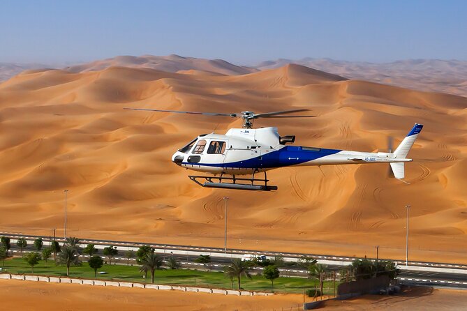 Dubai Helicopter Tour with Optional Private Hotel Transfers - Getting to the heliport and preparing to fly