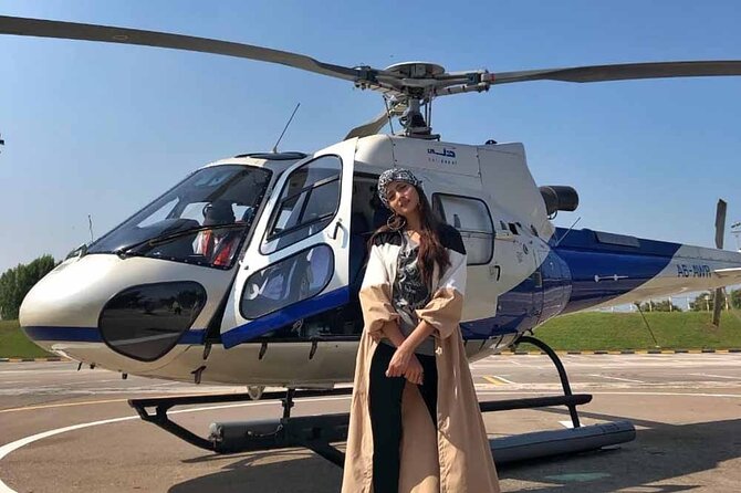 Dubai Iconic Helicopter Tour and Dhow Cruise Dinner Marina Combo - What the helicopter stop is like for different visitors