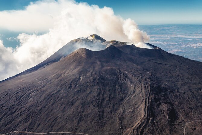 Etna : Group Helicopter Flight (including round trip car transfer) - A small helicopter, with seats set by weight