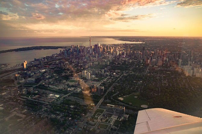 Exhilarating 120km Aerial Tour of Toronto with iflyTOTO - A close look at the CN Tower and Rogers Centre