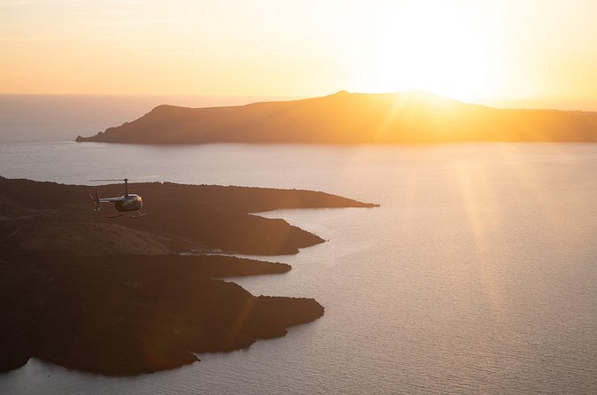 Experience Santorini Sunset by Helicopter - Akrotiri and the red coast