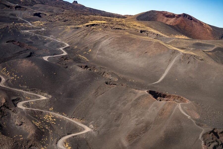 Fiumefreddo: Group Flight Helicopter Tour over Etna - Descending toward Rifugio Sapienza