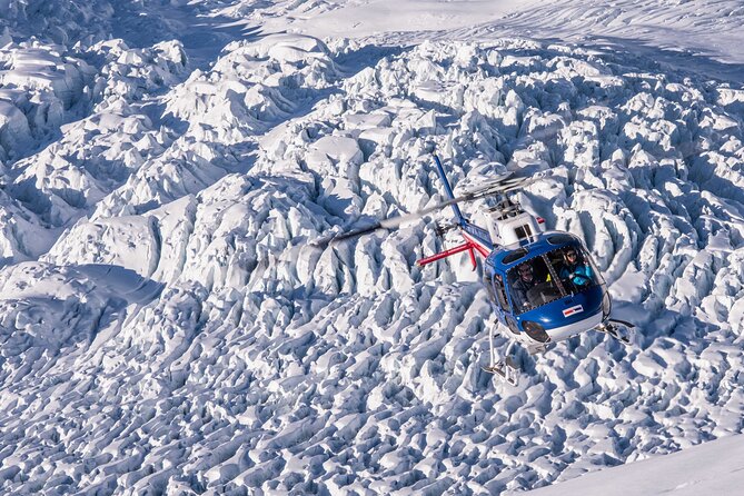 Fox Glacier: Twin Glacier Helicopter Flight with Snow Landing - The return flight over the icefalls