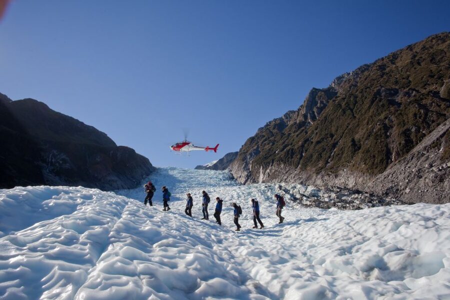 Fox Glacier: Up to 3 Hours Hike with Helicopter Transfer - Up to three hours among caves, arches, and blue ice
