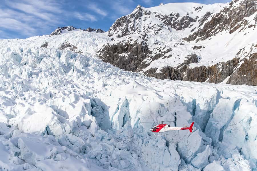 Franz Josef Glacier Helicopter Flight with Snow Landing - Flying above icefalls, crevasses, and forest