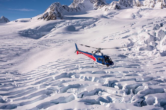 Franz Josef: Neve Discoverer Helicopter Flight with snow landing - The main reasons to book this flight