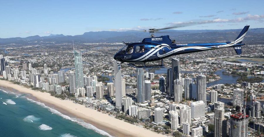 Gold Coast: Sea World and Broadwater Scenic Helicopter Tour - Crossing the coast toward Q1