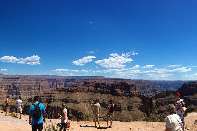 Grand Canyon Helicopter and Western Ranch Adventure Landing Tour - Flying below the West Rim