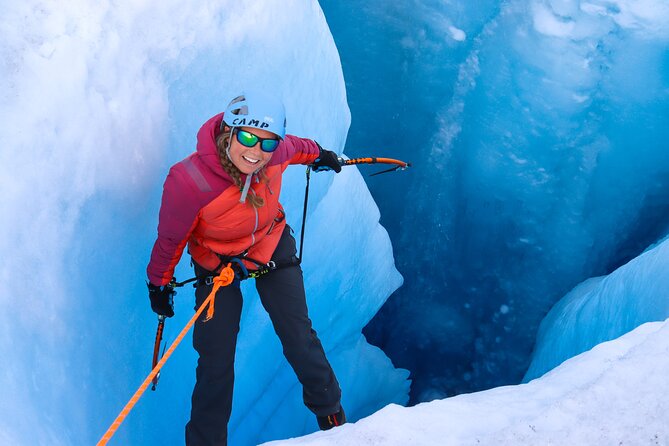 Heli Glacier Crevasse Ice Climbing- Summer - Entering a glacier moulin