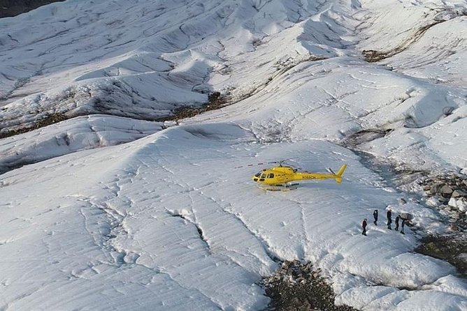 Helicopter to a Dogsledding Experience with a Glacier Landing - The second helicopter landing on exposed glacier ice