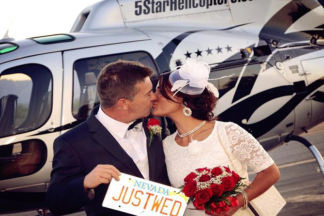 Las Vegas Night Flight Helicopter Wedding Ceremony - A wedding ceremony with Las Vegas below you