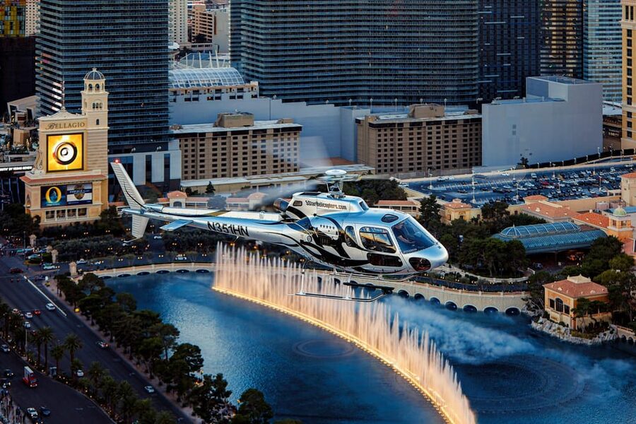 Las Vegas: Nighttime Helicopter Flight over the Strip - Bellagio, the Luxor beam, and the south Strip