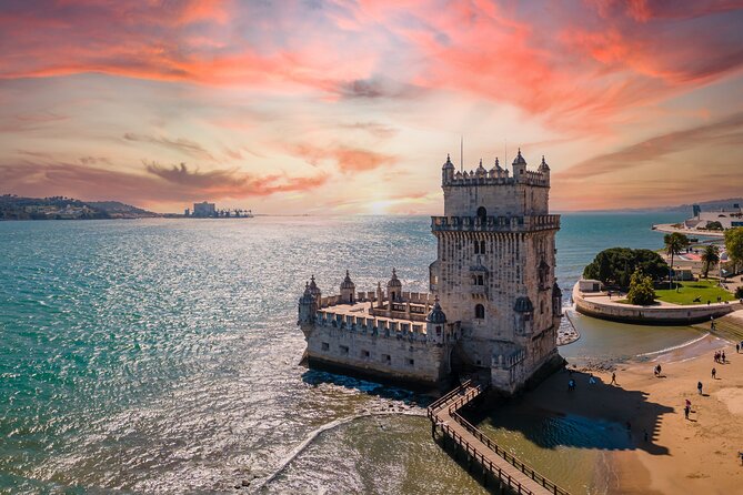 Lisbon 360 City Tour: Bike tour, Boat Trip and Helicopter Flight - A boat ride beneath the 25 de Abril Bridge