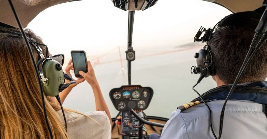 Lisbon: Guided Bike Tour, Helicopter Flight, and Boat Trip - Returning by Boat Under the 25th of April Bridge