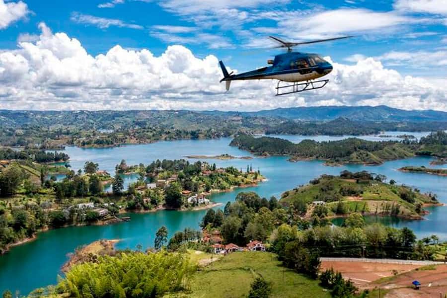 Medellín: Guatapé Private Tour with Helicopter & Boat Ride - Lunch and the real cost of the day