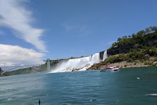 Niagara Falls Canada: Helicopter + Boat + Lunch & more US Pick-up - Journey Behind the Falls reveals the power from below