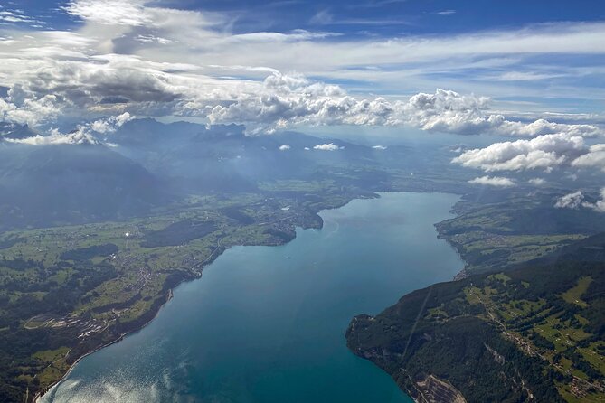 Private helicopter flight to Stockhorn mountain, with view to the Swiss Alps - A distant view of Bern