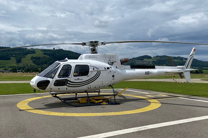 Private helicopter tour to the Swiss Alps - see the Eiger, Monch and Jungfrau - Lake Thun and its glacier-blue water