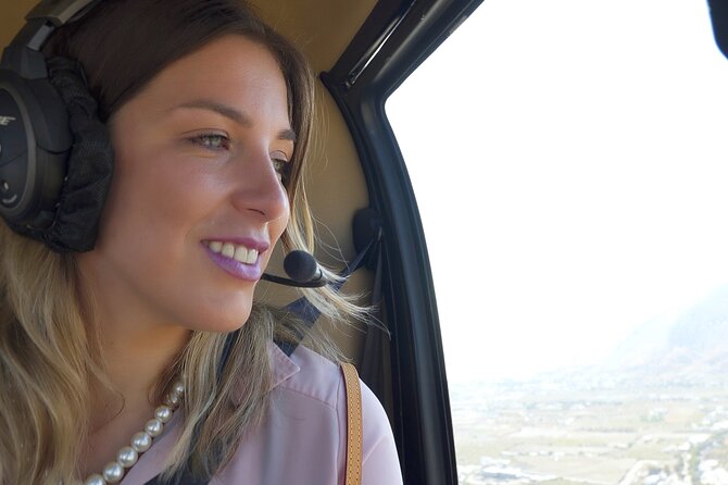 Private Helicopter Transfer from Mykonos to Santorini - Landing in Santorini and continuing to your hotel