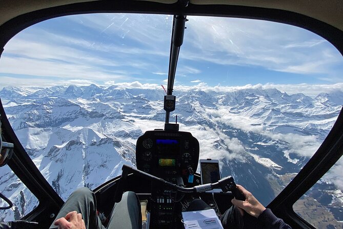 Private Swiss Alps helicopter tour over snow covered mountain peaks and glaciers - What the check-in and flight feel like