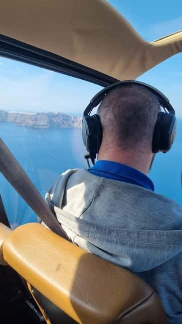 Santorini: Helicopter Sightseeing Flight Over Caldera - Vineyards, volcanic ground, and the Aegean