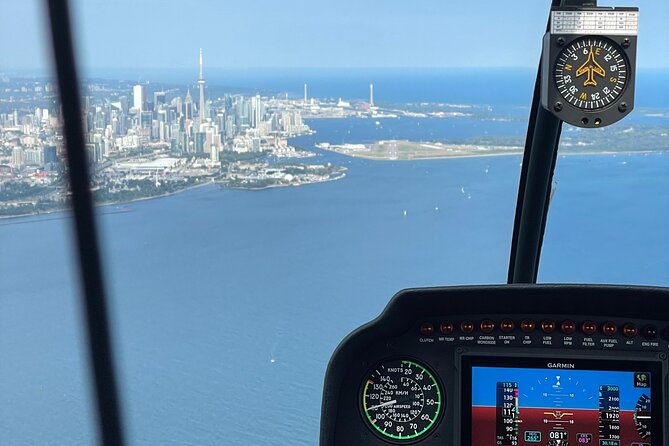 Toronto Skyline Helicopter Tour CN Tower Loop - The Rogers Centre roof may offer a bonus view
