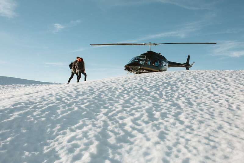 Vancouver: Coastal Mountain Landing Helicopter Tour - Widgeon Lake, cliffs, and a falling waterfall