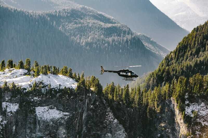 Vancouver: Coastal Mountain Landing Helicopter Tour - Old-growth forest and snow-covered peaks